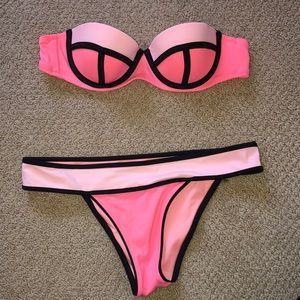 VS swim. Top is 32B bottom is M
